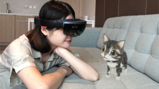 A user interacting with an AR pet using glasses.